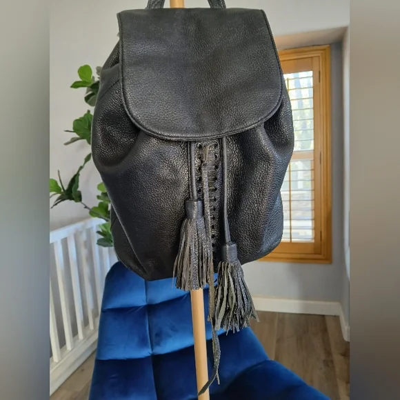 Rebecca Minkoff Isobel Tassel Backpack in Black Pebbled Leather. Rebecca Minkoff Isobel Backpack SKU:8707645 - YouTube main image 2